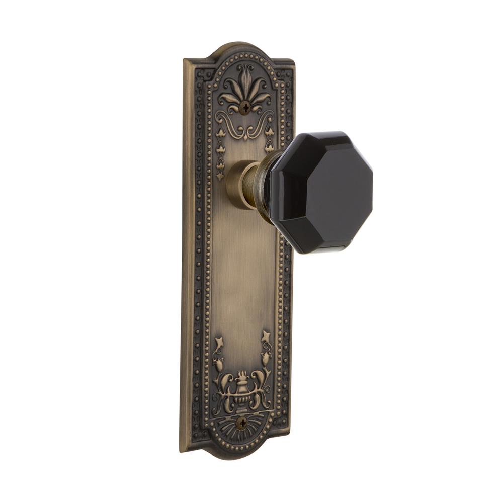 Nostalgic Warehouse MEAWAB Colored Crystal Meadows Plate Passage Waldorf Black Door Knob in Antique Brass